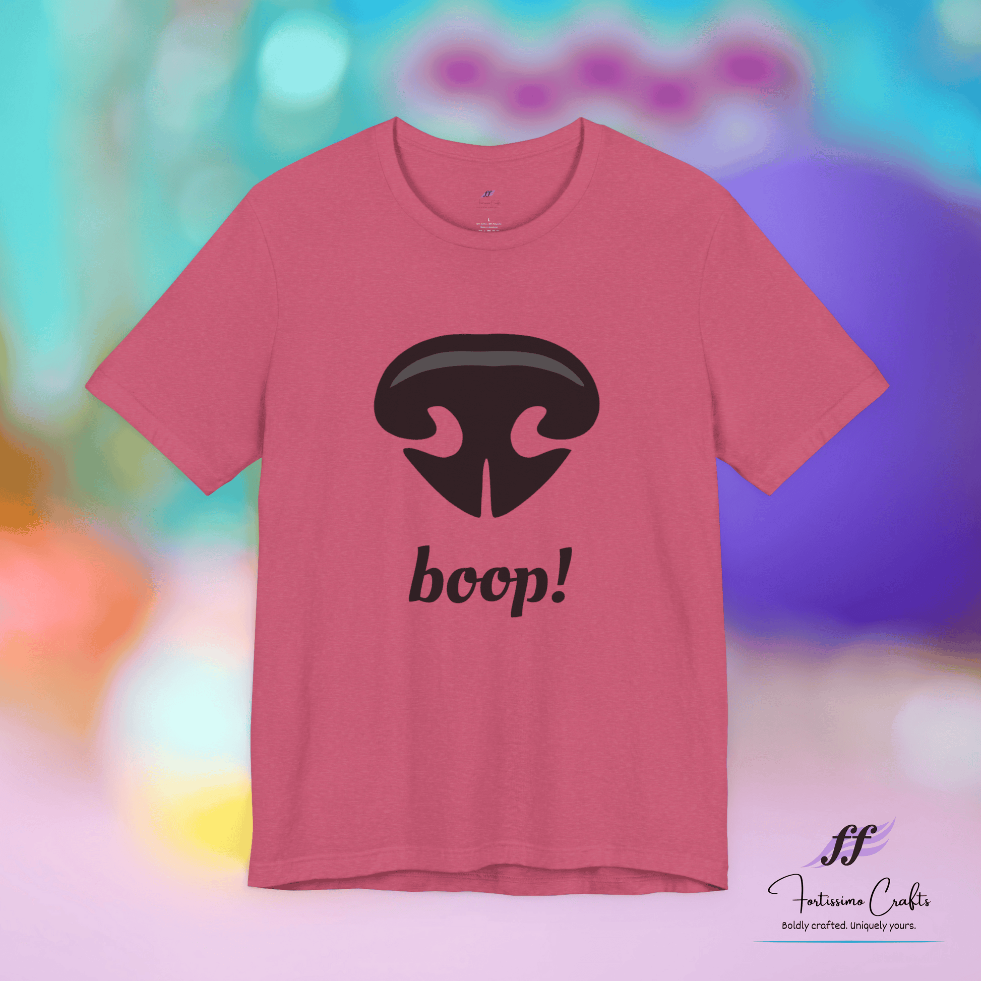 Pink t-shirt with dog nose and 'boop!' text on a colorful background