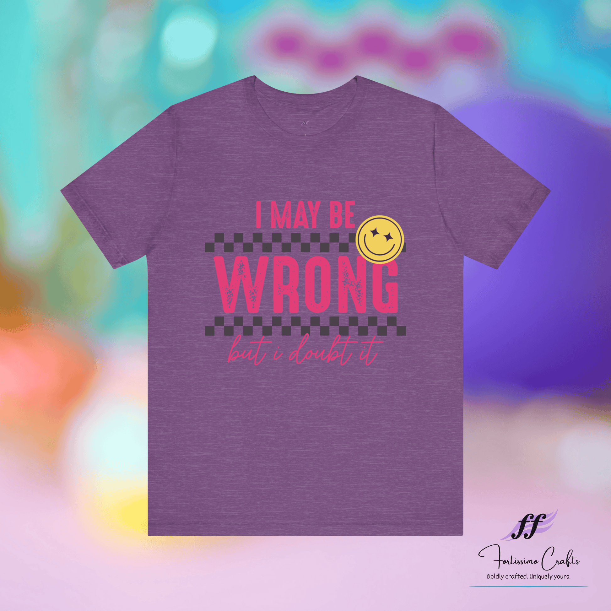 Purple t-shirt with "I may be wrong, but I doubt it" and smiley face graphic on a colorful blurred background