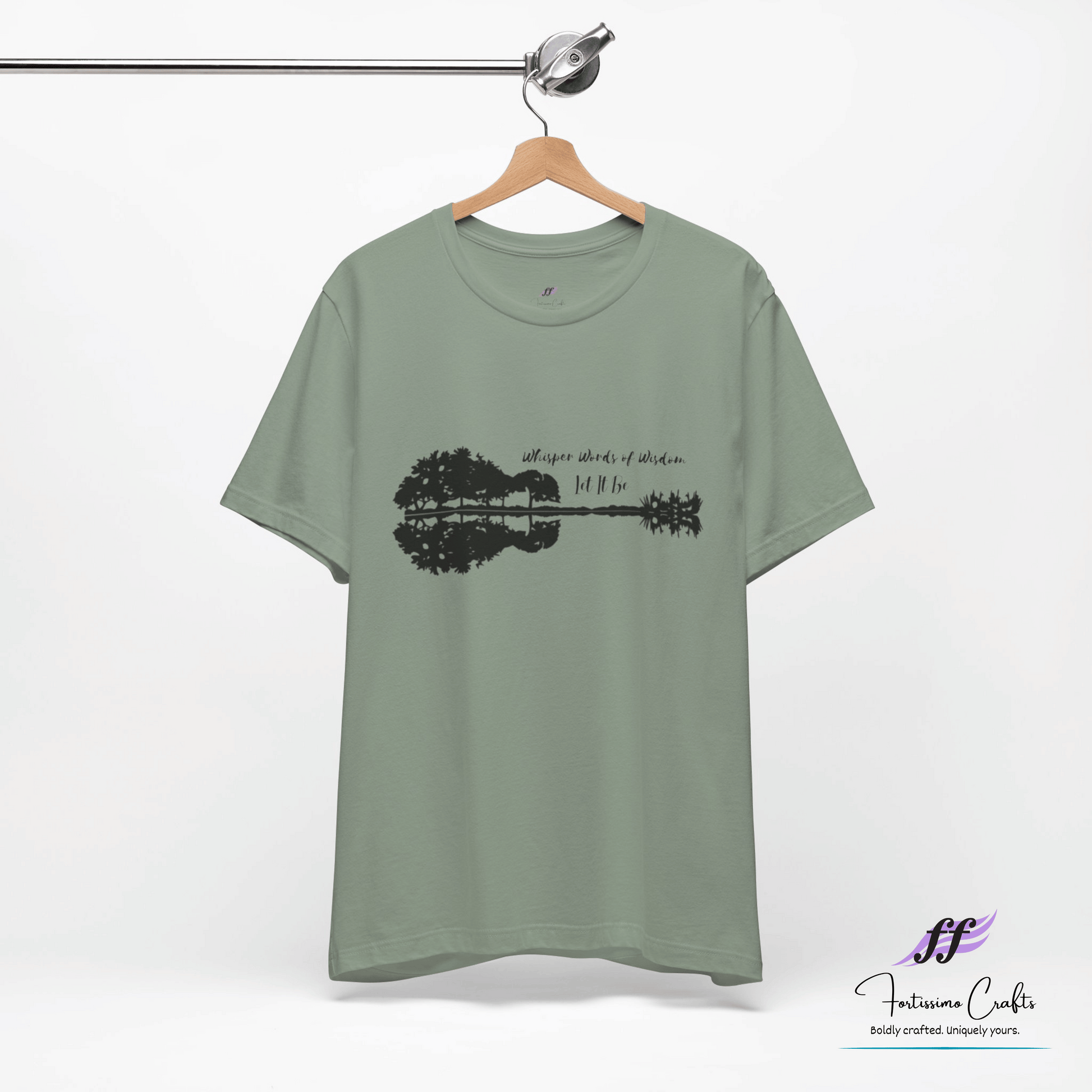 Green t-shirt with a guitar graphic and text on a white background