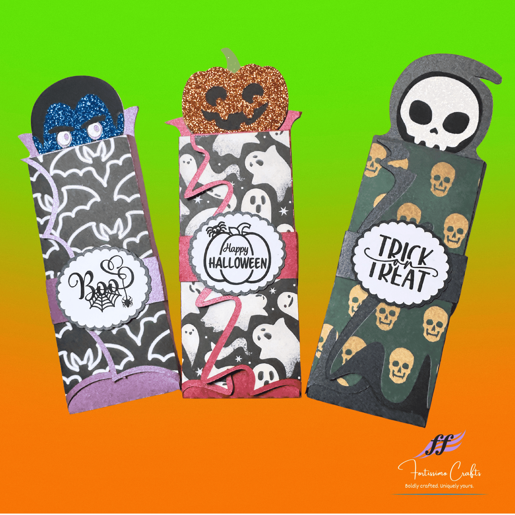 Three Halloween-themed boxes with decorative designs on a gradient background