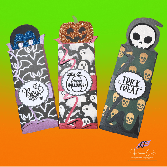 Three Halloween-themed boxes with decorative designs on a gradient background