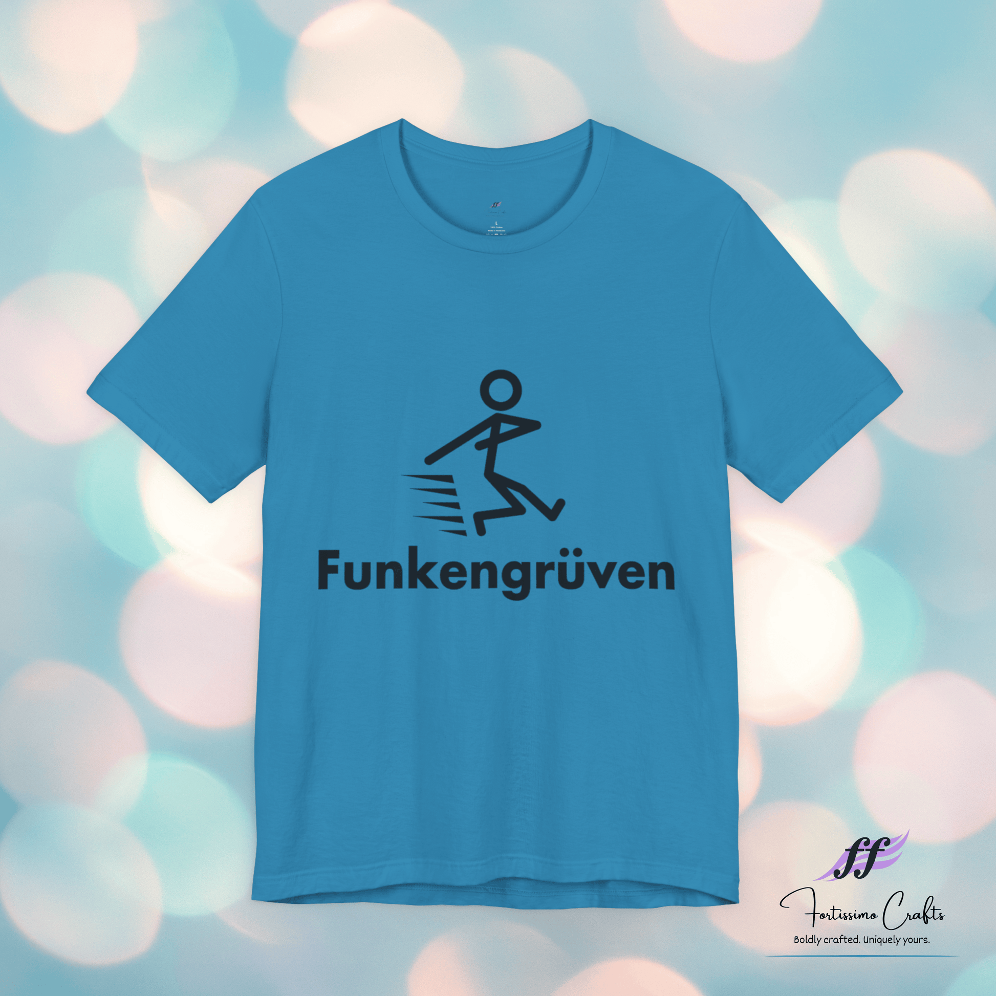 Blue t-shirt with black logo and text on a blurred background