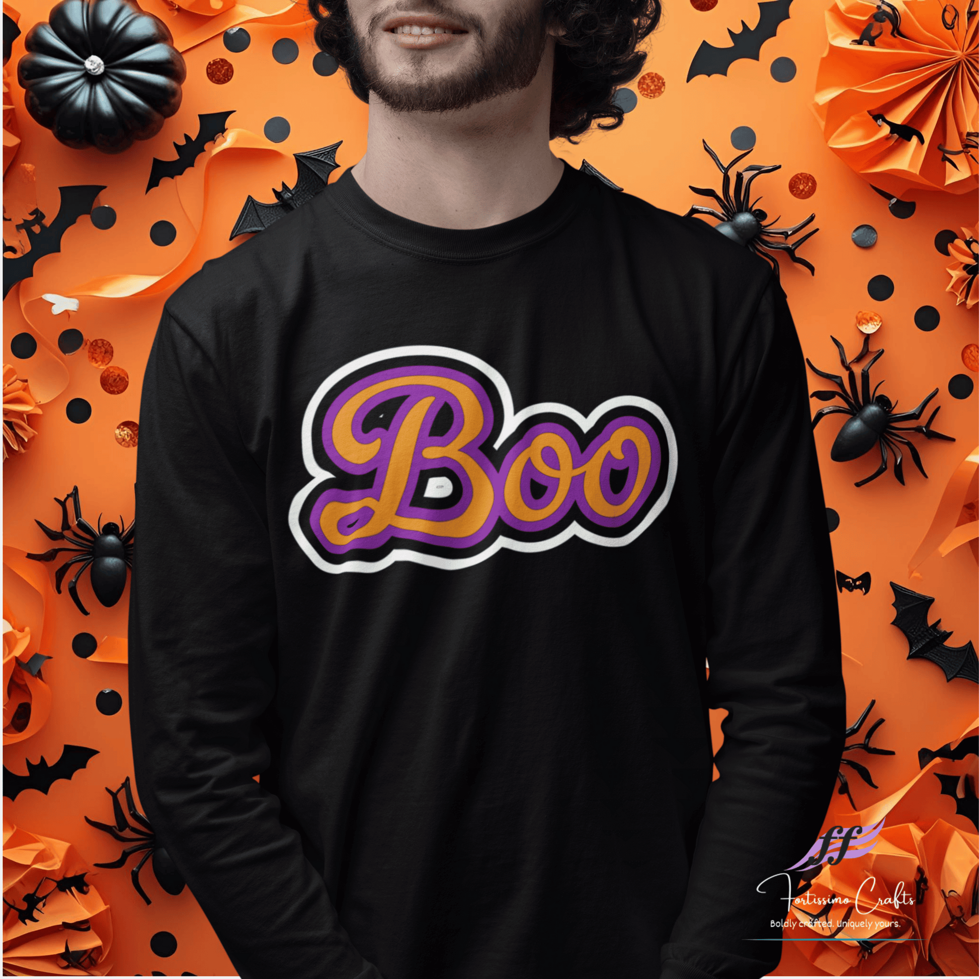 Black long-sleeve shirt worn by a man with 'Boo' design on an orange Halloween-themed background