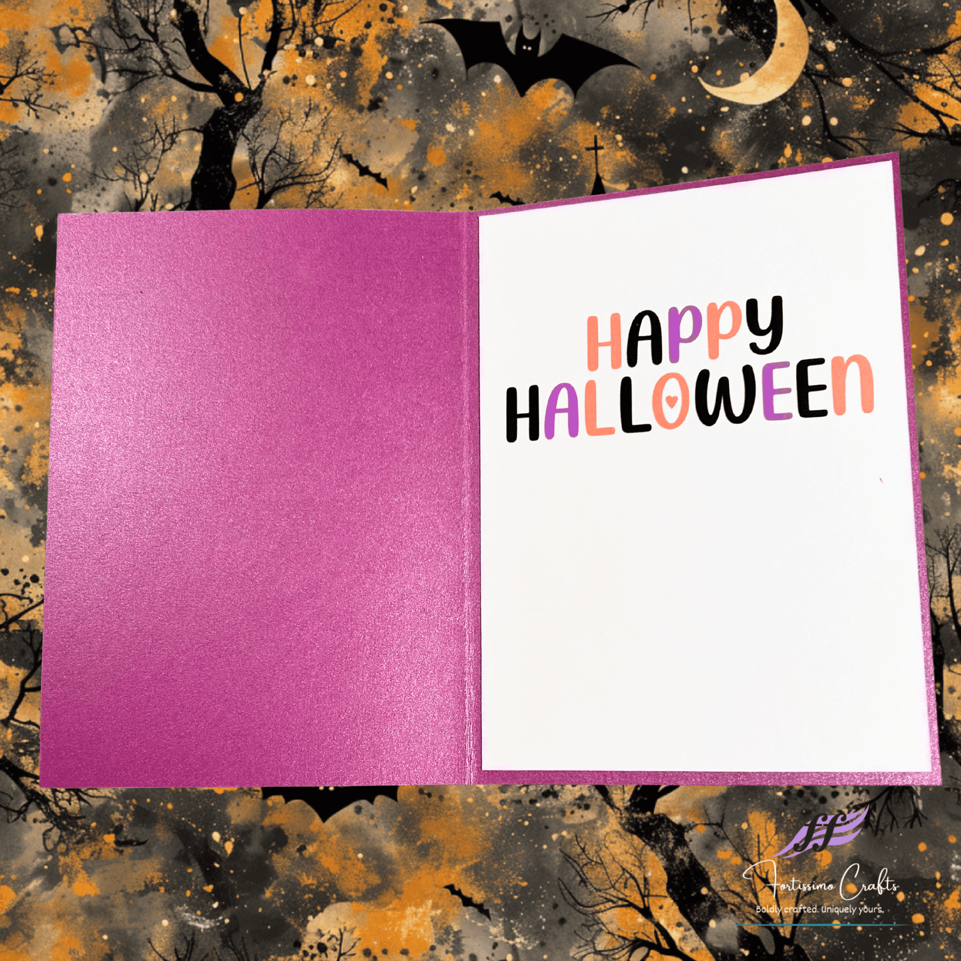 Halloween-themed greeting card with 'Happy Halloween' text on a colorful background