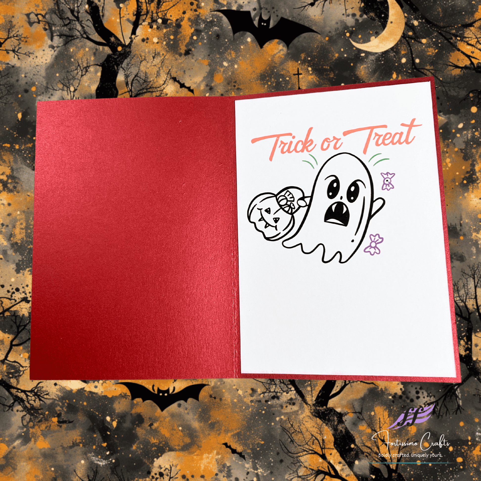 Halloween-themed card with ghost illustration and 'Trick or Treat' text on a red envelope against a spooky background.