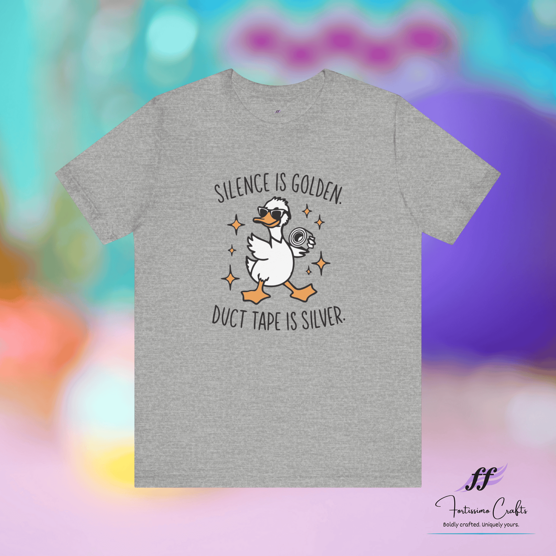 Gray t-shirt with a duck graphic and text on a colorful background