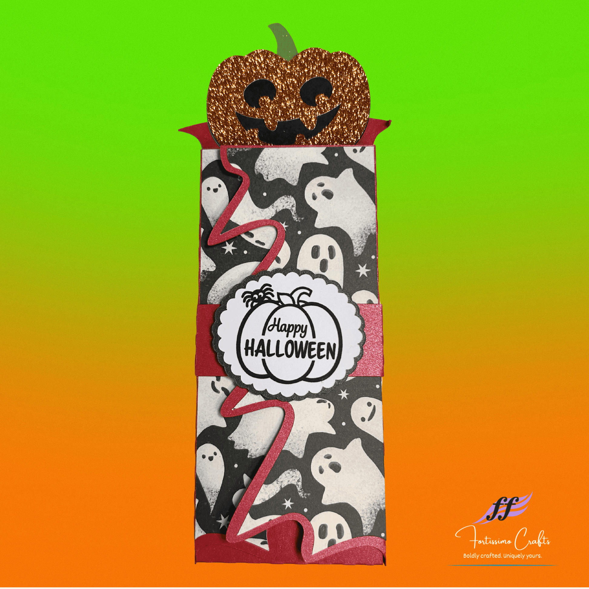 Halloween-themed jack-o-lantern candy bar wrapper with red and black design on a gradient background