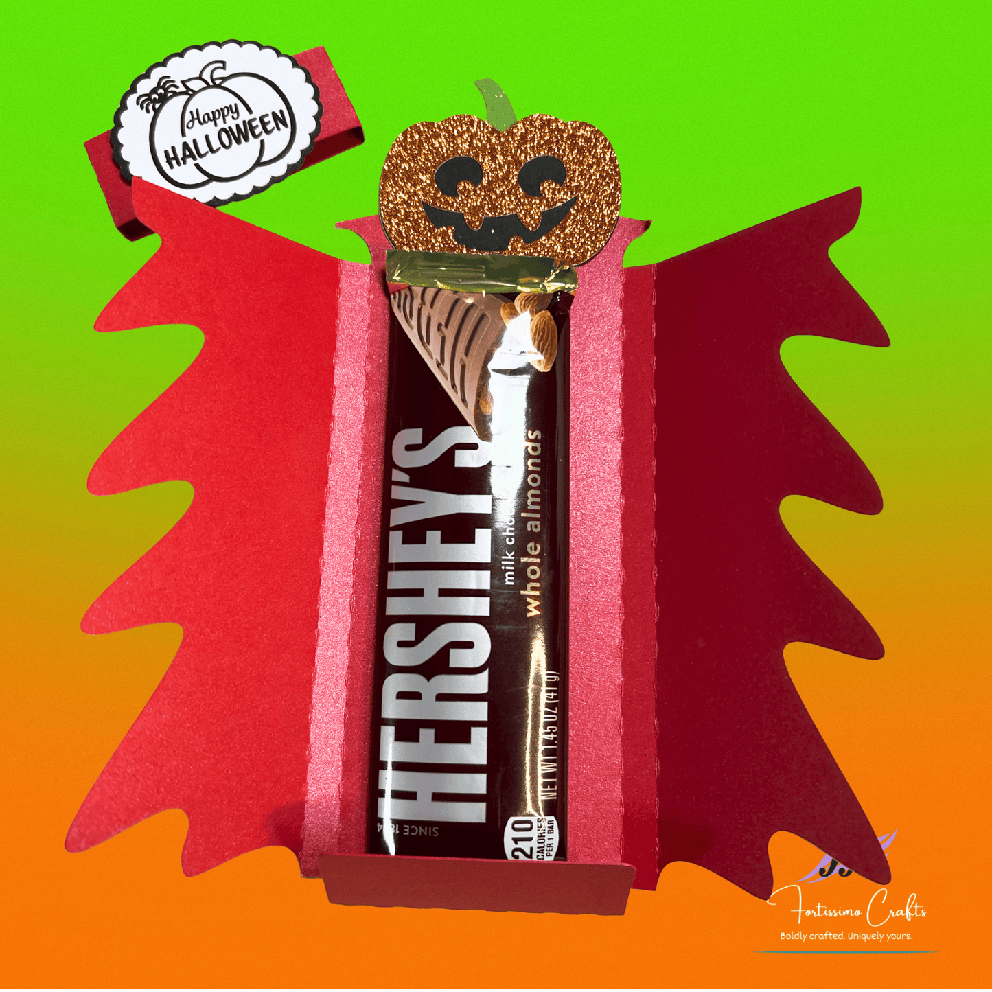 Halloween-themed jack-o-lantern candy bar wrapper with red and black design inside view with candy bar on a gradient background