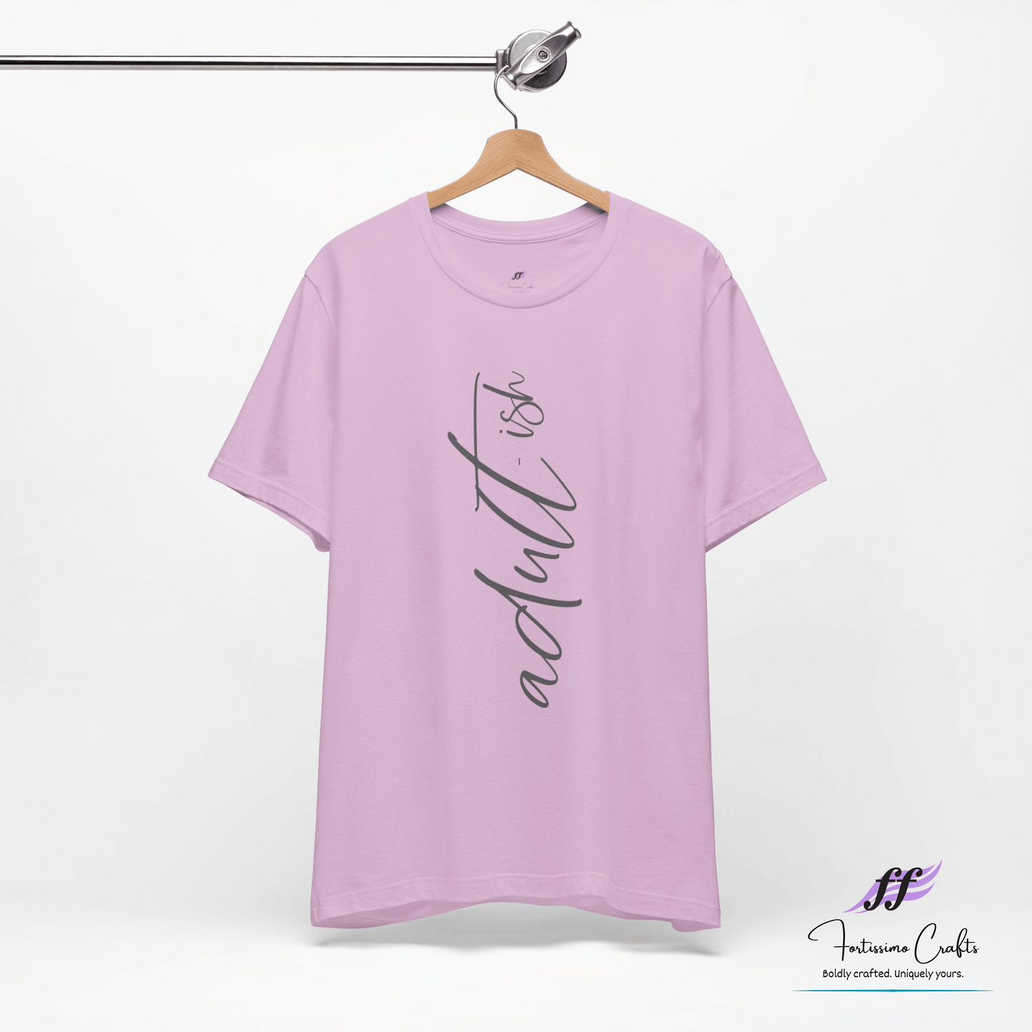 Purple t-shirt with text on a hanger against a white background