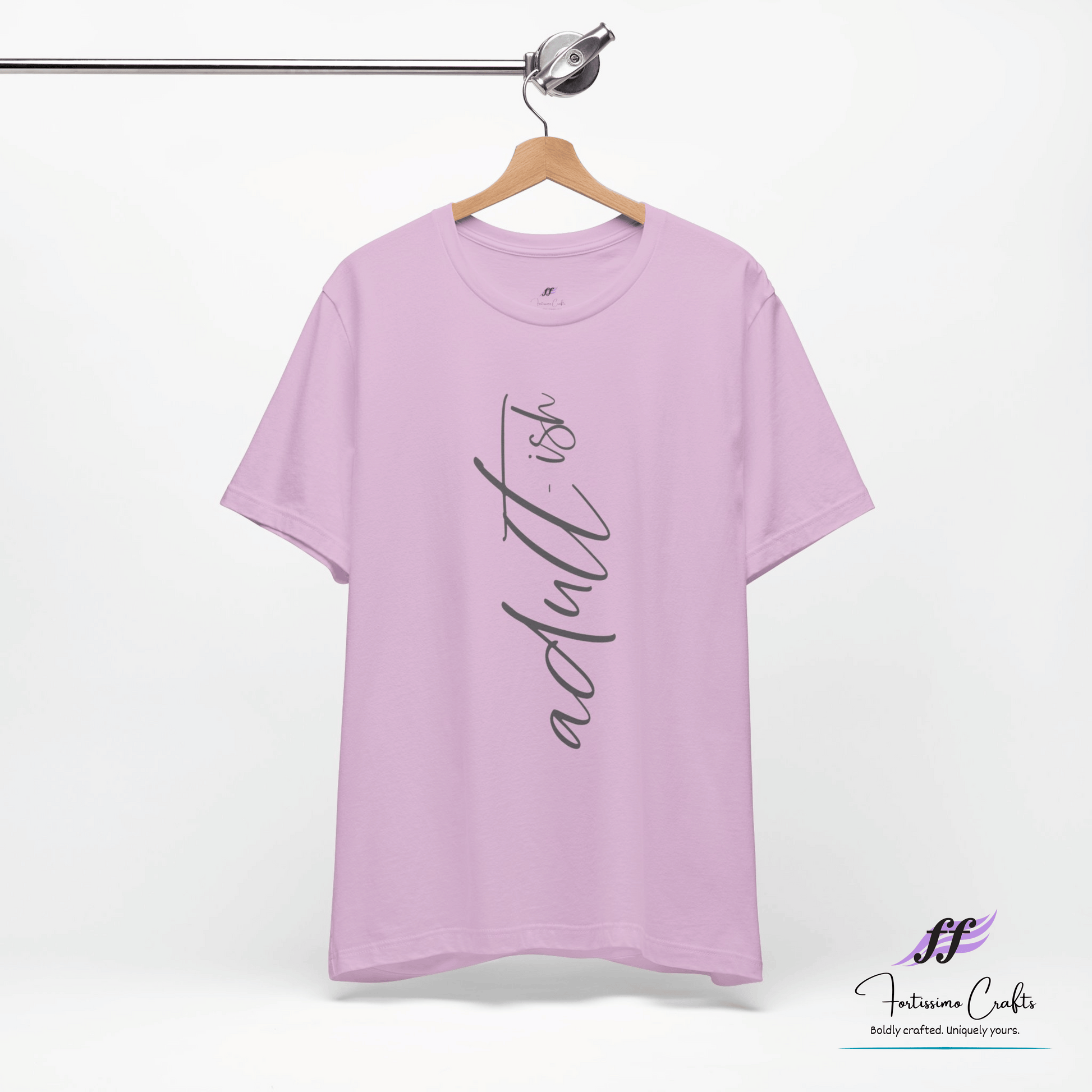 Purple t-shirt with text on a hanger against a white background