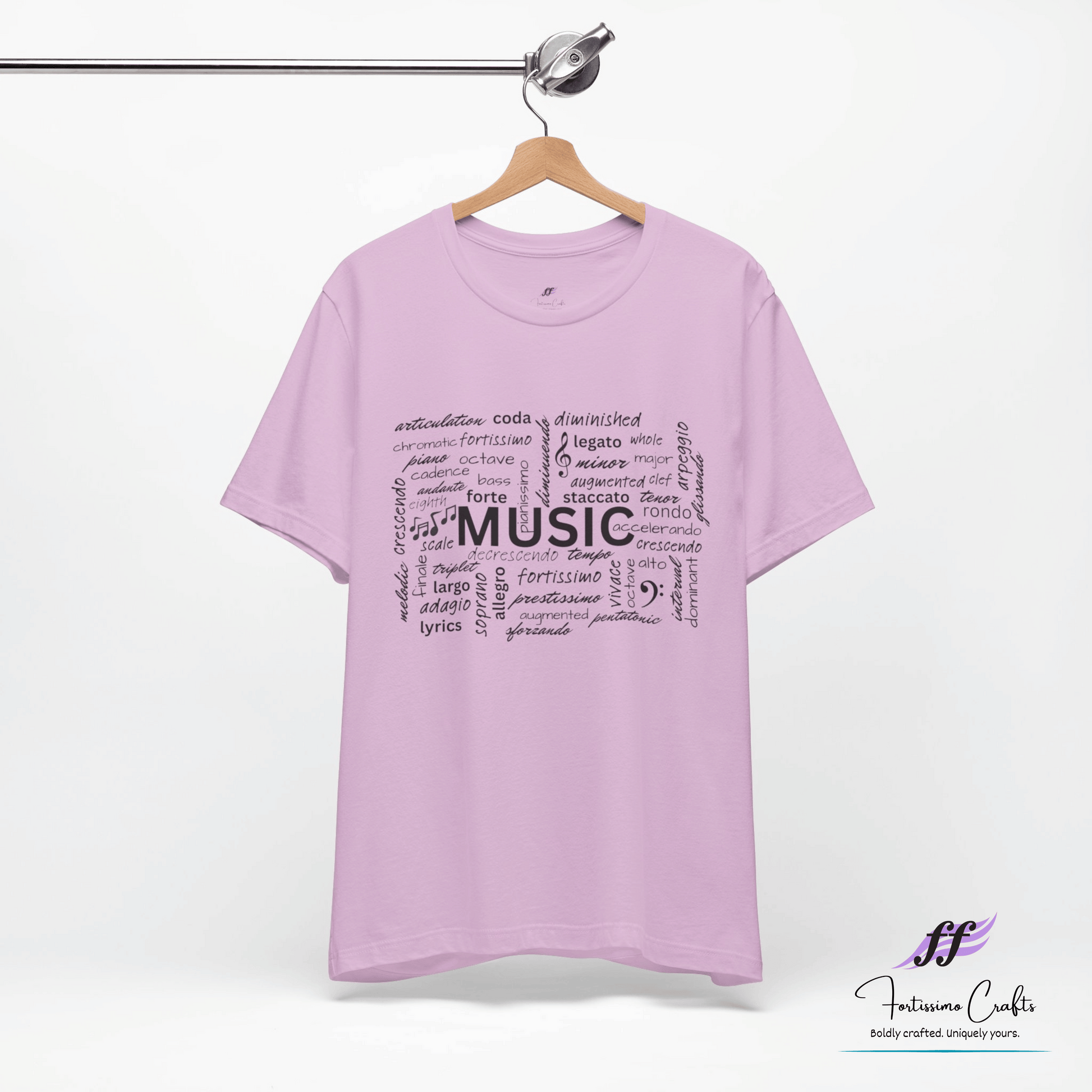 Purple t-shirt with music-themed text on a hanger against a white background