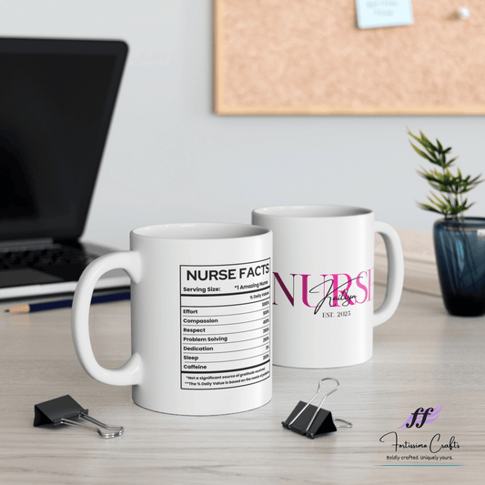 Two mugs on a desk with one labeled 'Nurse Facts' and the other with a pink design, in front of a laptop.