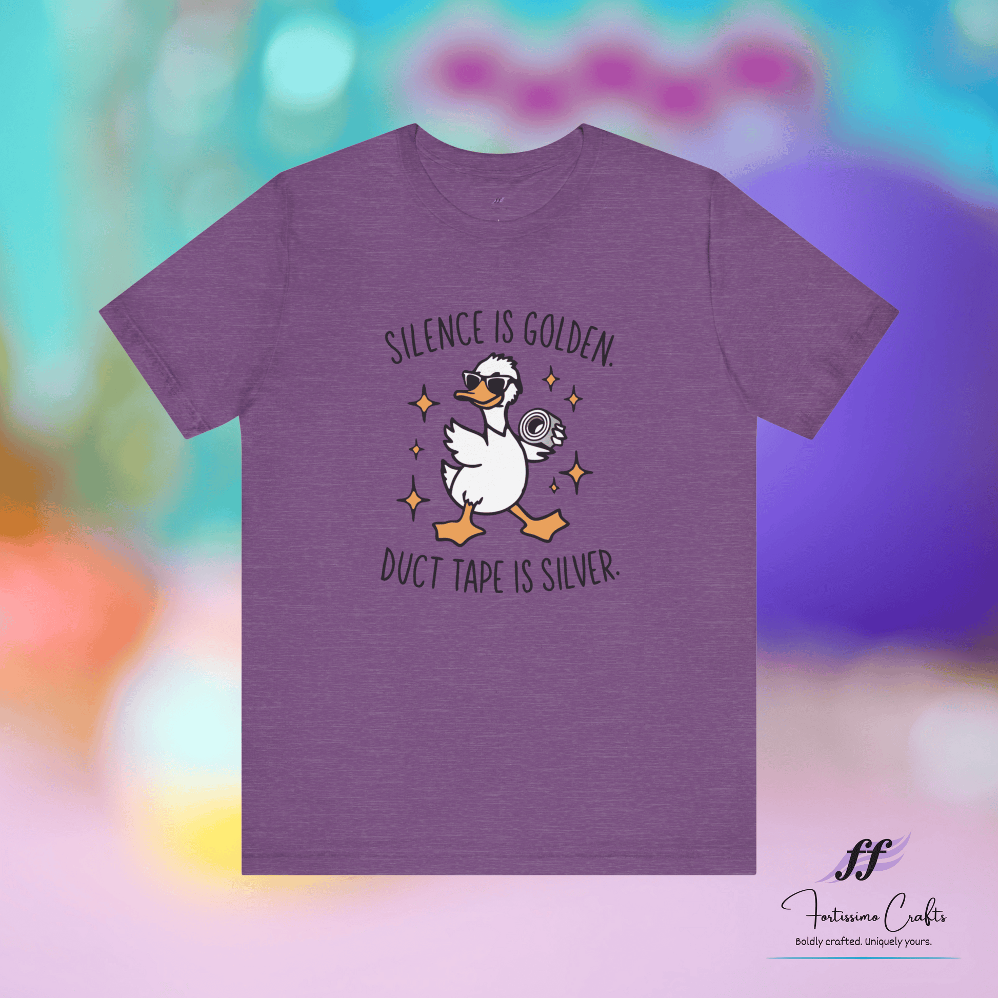 Purple t-shirt with a duck graphic and text on a colorful background