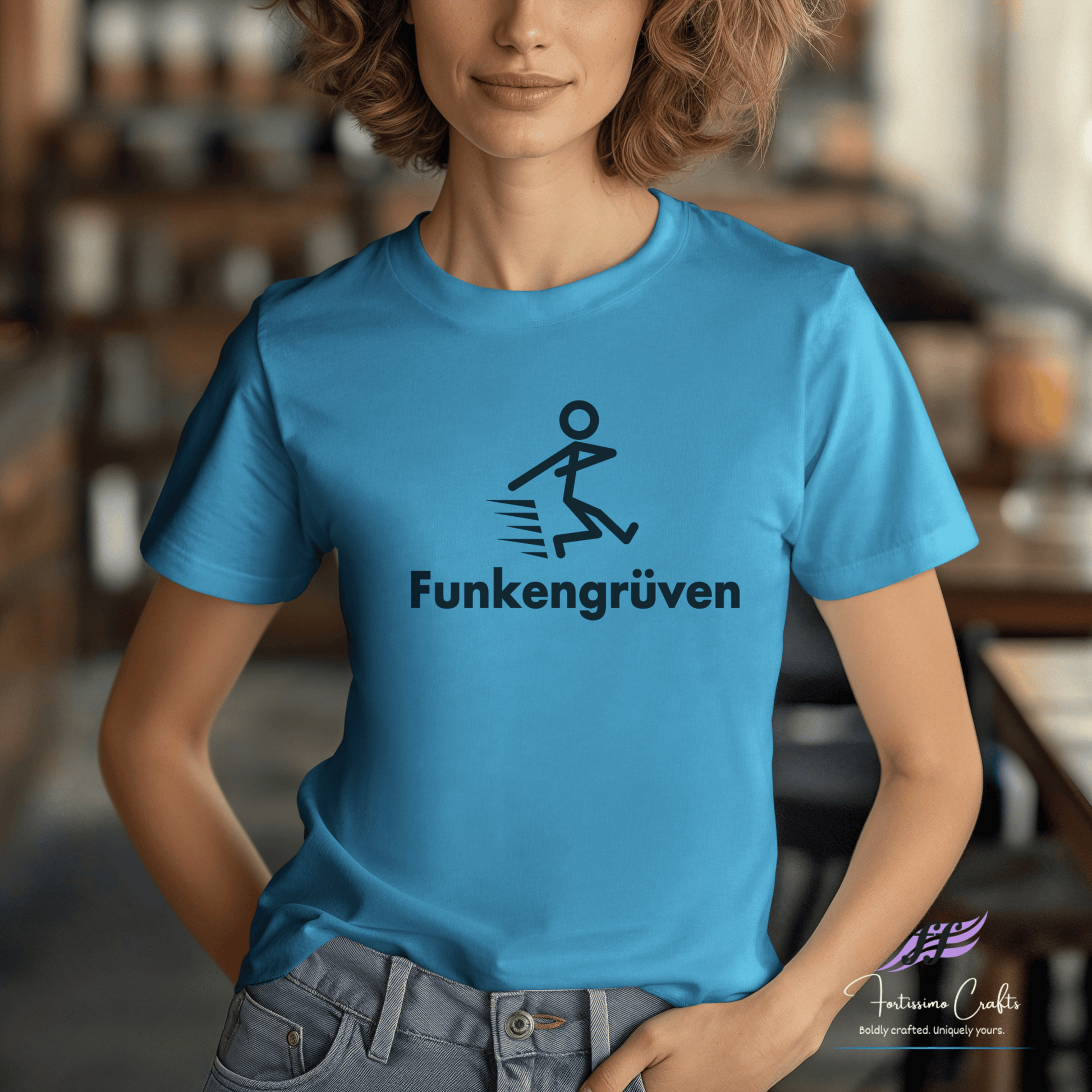 Person wearing a blue t-shirt with 'Funkengruven' design in a blurred indoor setting