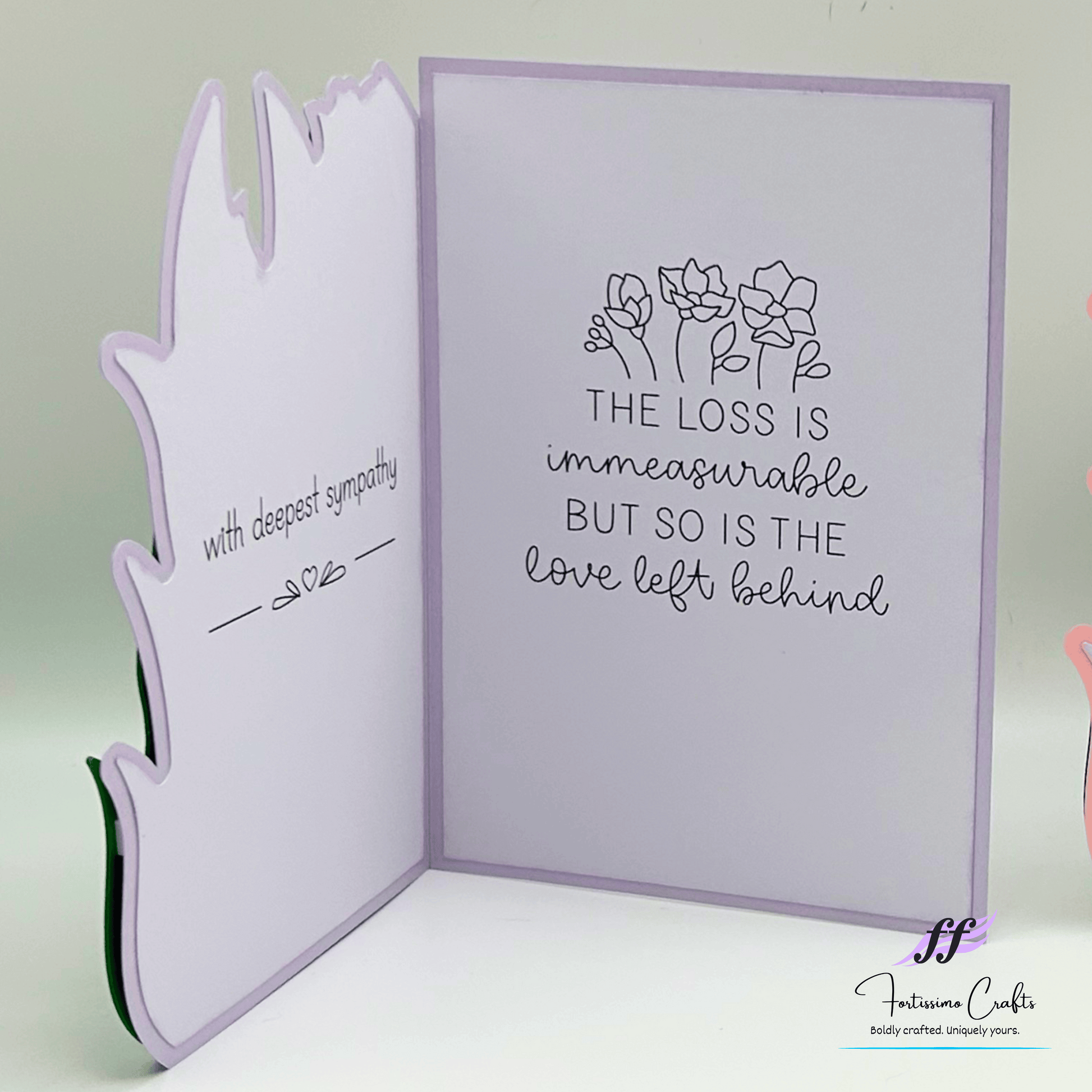 Sympathy card with floral design and text on a light background