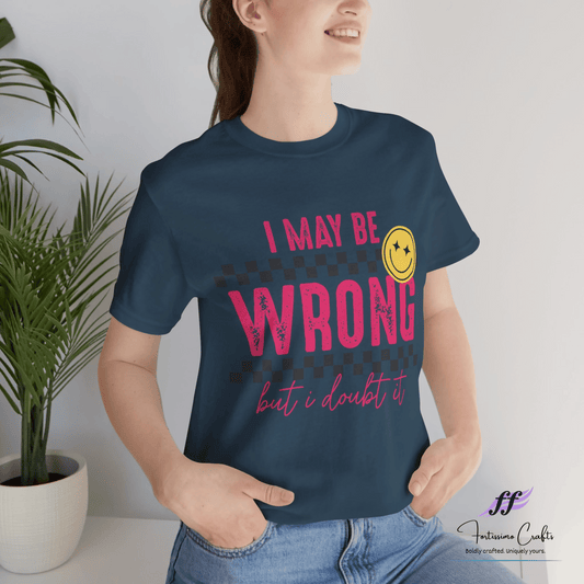 Person wearing a navy blue t-shirt with a humorous quote and smiley face design.