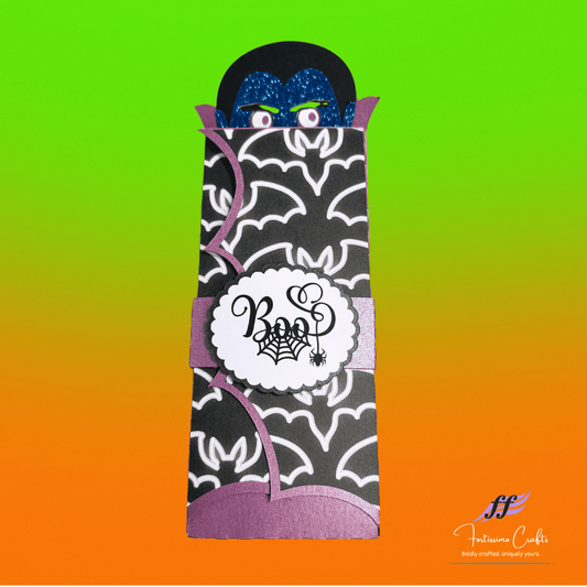 Halloween-themed vampire candy bar wrapper with purple and black design on a gradient background