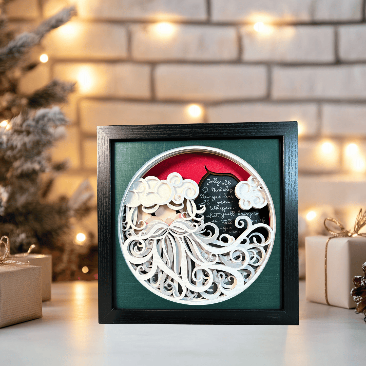 Christmas/Holiday framed 3D layered paper art of Santa's face with intricate beard and words to the song "Jolly Old St. Nicholas" on the back layer on a festive background.